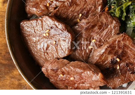 Bibimbap-style beef skirt steak rice bowl made with beef skirt steak Bibimbap-style beef skirt steak rice bowl made with beef skirt steak 121391631