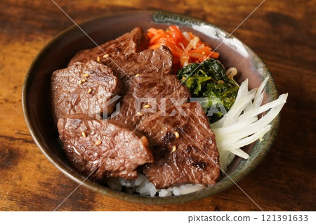 Bibimbap-style beef skirt steak rice bowl made with beef skirt steak Bibimbap-style beef skirt steak rice bowl made with beef skirt steak 121391633