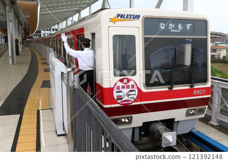Kita-Osaka Kyuko Railway Namboku Line 8000 series train stopped at Minoh Kayano Station 121392148