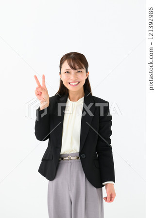 Business Middle-aged Woman Peace Sign Business Middle-aged Woman Peace Sign 121392986