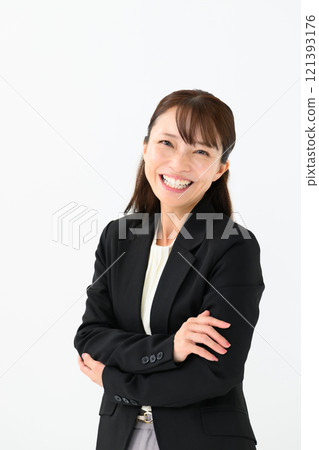 Business middle-aged woman with arms crossed Business middle-aged woman with arms crossed 121393176