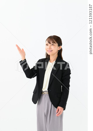 Business middle-aged woman waving her hands Business middle-aged woman waving her hands 121393187