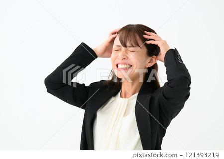 Business middle-aged woman holding her head Business middle-aged woman holding her head 121393219
