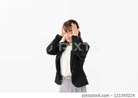 Business middle-aged woman holding her head Business middle-aged woman holding her head 121393229