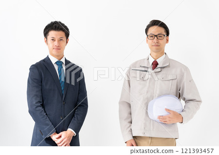 Portrait of a man in work clothes and a man in a suit 121393457