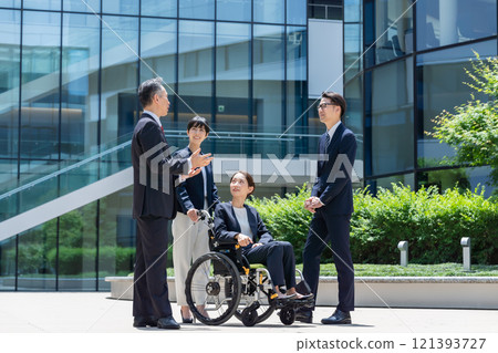 Business wheelchair team 121393727