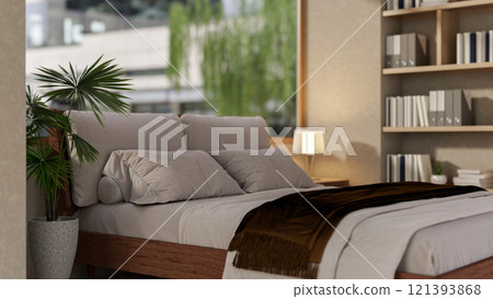 The interior design of a modern, elegant bedroom features a comfortable bed and sleek decor. 121393868