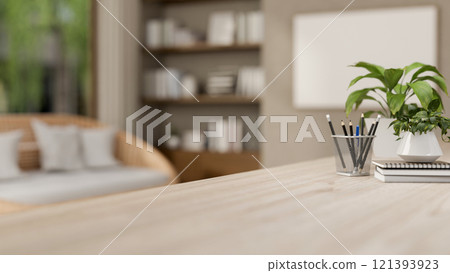 A close-up of a space on a wooden tabletop in a contemporary cozy living room 121393923