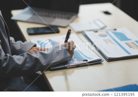 Business Documents, Auditor businesswoman checking searching document legal prepare paperwork or report for analysis TAX time,accountant Documents data contract partner deal in workplace office Business Documents, Auditor businesswoman checking searching document legal prepare paperwork or report for analysis TAX time,accountant Documents data contract partner deal in workplace office 121395195