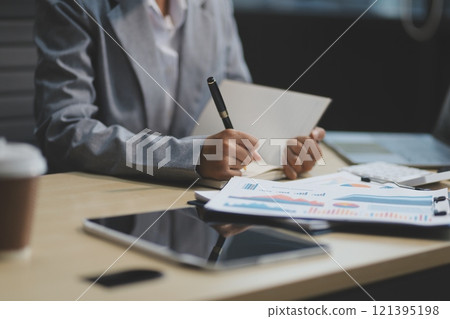 Business Documents, Auditor businesswoman checking searching document legal prepare paperwork or report for analysis TAX time,accountant Documents data contract partner deal in workplace office Business Documents, Auditor businesswoman checking searching document legal prepare paperwork or report for analysis TAX time,accountant Documents data contract partner deal in workplace office 121395198