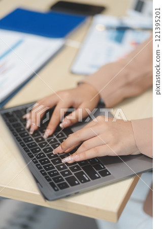 business documents businessman check legal document review Prepare documents or analysis reports, tax items, accounting documents, data contracts, office partner agreements. 121395201