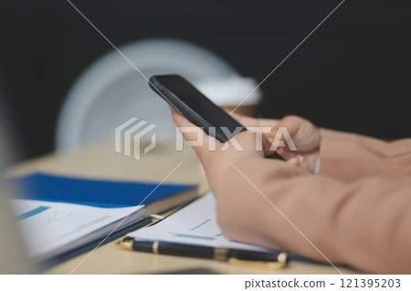 business documents businessman check legal document review Prepare documents or analysis reports, tax items, accounting documents, data contracts, office partner agreements. 121395203