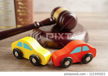 Car accident lawsuit and insurance, Judge hammer with car model. 121395851