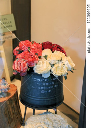 Realistic artificial flower arrangements, stylish fake greenery, interior arrangements 121396605