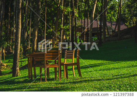 travel and people activity concept with camping on grass with mountain and lake on foreground travel and people activity concept with camping on grass with mountain and lake on foreground 121397388