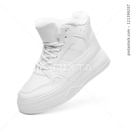 warm winter women's white boot shoe isolated on white 121399287