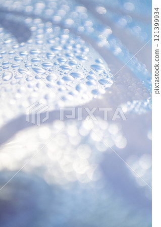 Colorful swim rings floating in a leisure pool - summer image 121399934