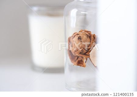 Dried flowers in a glass bottle Dried flowers in a glass bottle 121400135
