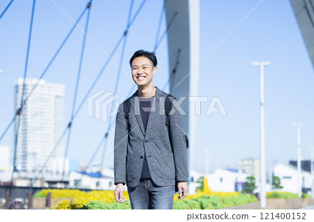 man walking outdoors man walking outdoors 121400152