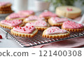 Pink frosted cupcakes for Valentines Day celebration 121400308