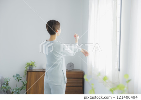 Woman waking up in the morning Woman waking up in the morning 121400494