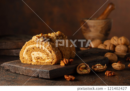 Cake with brown sugar, walnuts, and cream. Cake with brown sugar, walnuts, and cream. 121402427