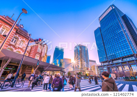 Tokyo cityscape in Japan. End of the year. Tokyo Station Marunouchi North Exit. Even though it was a holiday, there were a lot of people there... In the background are the office buildings of Marunouchi. 121402774