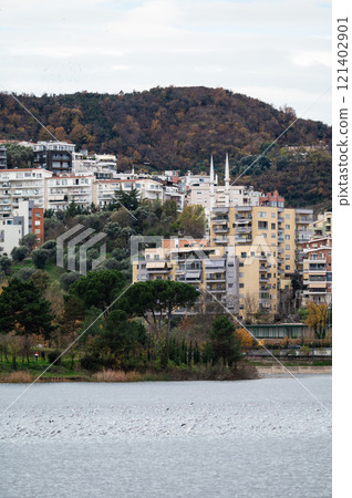 Landscape view over the city, artificial lake and park of Tirana, Albania Landscape view over the city, artificial lake and park of Tirana, Albania 121402901