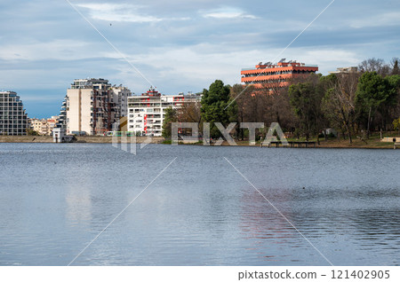 Landscape view over the city, artificial lake and park of Tirana, Albania Landscape view over the city, artificial lake and park of Tirana, Albania 121402905