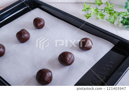 Rolled cocoa cookie dough 121403947