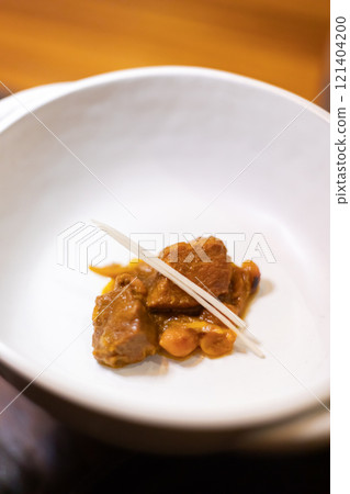 Yellow curry with pork, ginger and garlic Yellow curry with pork, ginger and garlic 121404200