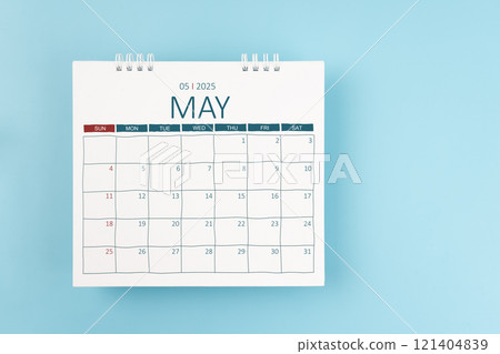 May 2025 Monthly desk calendar for 2025 year on blue color background. 121404839