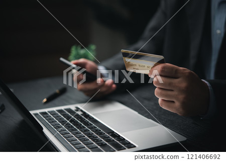 hand holding credit card digital wallet online payment and payroll commerce hand holding credit card digital wallet online payment and payroll commerce 121406692