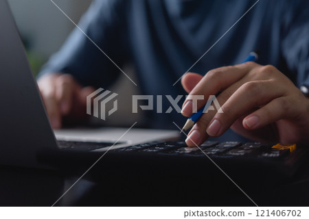 Businessman using calculator bookkeeping payroll and budget tax. 121406702