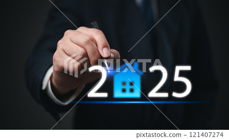 Businessman pointing at 2025 with a glowing house icon representing real estate growth and market innovation. Perfect for property investment, finance, Businessman pointing at 2025 with a glowing house icon representing real estate growth and market innovation. Perfect for property investment, finance, 121407274