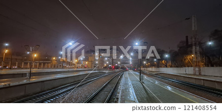 Access roads of Odessa railway station.Empty platforms of the night station. Access roads of Odessa railway station.Empty platforms of the night station. 121408554
