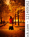 Girls playing in autumn park 121409162