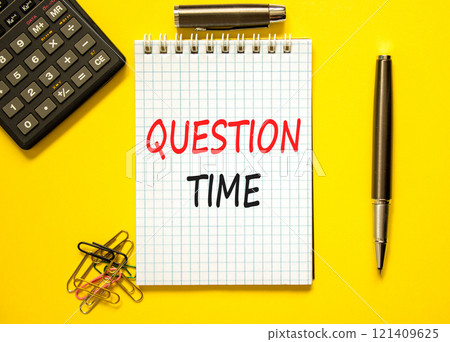 Question time symbol. Concept words Question time on beautiful white note. Beautiful yellow paper background. Black calculator. Business and question time concept. Copy space. 121409625