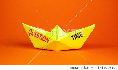 Question time symbol. Concept words Question time on beautiful yellow paper boat. Beautiful orange paper background. Business and question time concept. Copy space. 121409649