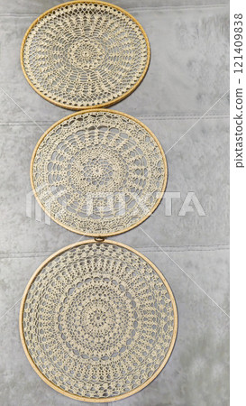 Crochet napkin on a wooden frame. Mandala with different patterns Decor Handmade 121409838