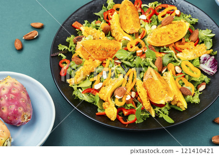 Salad of cactus fruits, peppers and almonds. 121410421