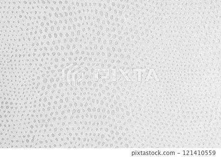 Cloth structure of  jacquard white fabric with abstract shabby spotted texture closeup, macro 121410559