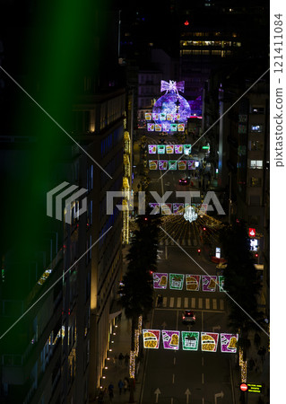 Christmas. Light. Christmas lights through the streets of Vigo. Decorating streets of the city. Fir tree with Christmas lights. Light tree. On. VIGO. SPAIN. 23 December 2024. Christmas. Light. Christmas lights through the streets of Vigo. Decorating streets of the city. Fir tree with Christmas lights. Light tree. On. VIGO. SPAIN. 23 December 2024. 121411084