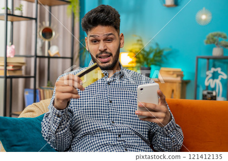 Annoyed businessman Indian guy buying bank refuse problem unsuccessful payment lack of money balance Annoyed businessman Indian guy buying bank refuse problem unsuccessful payment lack of money balance 121412135
