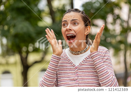 Irritated angry young woman screams from stress tension problems, shock, rage, nervous, quarrel Irritated angry young woman screams from stress tension problems, shock, rage, nervous, quarrel 121412389