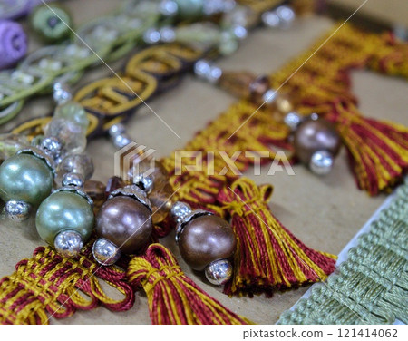beautiful ruffles ribbons and beads for sewing and needlework. High quality photo 121414062
