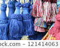 decorative brush pendants for the canopy. colored tassels made of thread for hanging on curtains. items for needlework sewing and embroidery for home comfort and window decoration. High quality photo 121414063