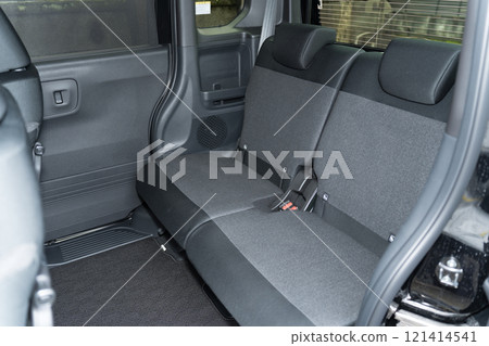 Back seat of a compact car 121414541