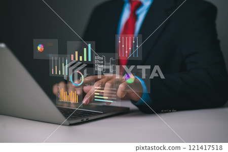 Business people use computers to analyze business and manage corporate data in office, Financial and marketing strategy, Business analytics with charts, KPIs to improve organizational performance. Business people use computers to analyze business and manage corporate data in office, Financial and marketing strategy, Business analytics with charts, KPIs to improve organizational performance. 121417518