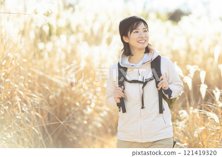 A woman trekking 121419320